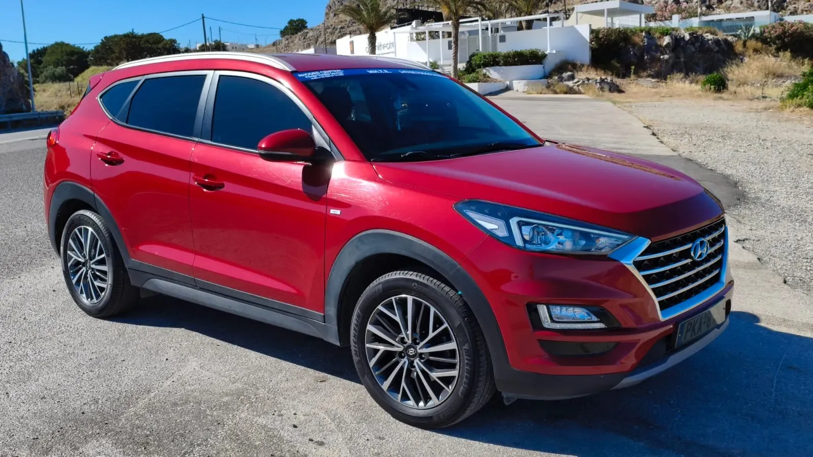 Red Hyundai Tucson private transfer SUV in Rhodes